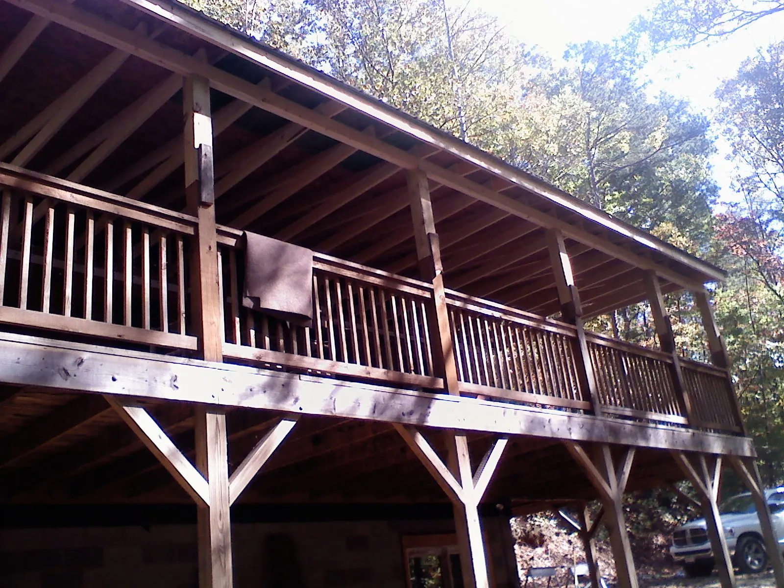 Timber framing under a new elevated porch and deck — Roof Leak Repair in Franklinville by Roofing Brothers
